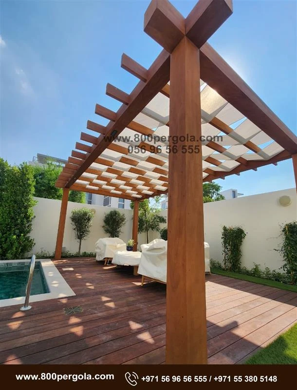 wooden pergola made with premium Red Meranti wood and knitted fabric for our client in Meydan – MBR City.