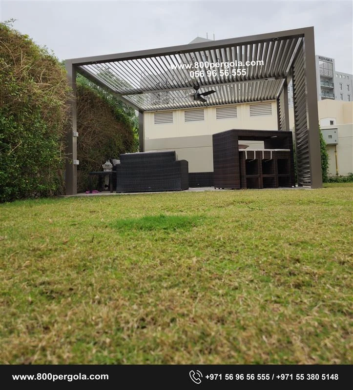 Fixed Louvered Pergola with aluminum elliptical louvers and a privacy screen at Safi Townhouse, Dubai